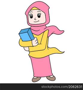 a beautiful woman wearing a hijab carrying a holy book goes to the mosque