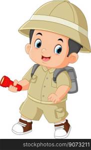 a brave adventurous boy walks and smiles while carrying a flashlight