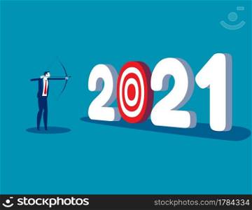 A businessman aiming at number 2021. The goal of year