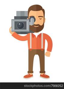 A caucasian videographer with his video camcorder. A Contemporary style. Vector flat design illustration isolated white background. Vertical layout. Videographer with his video camcorder