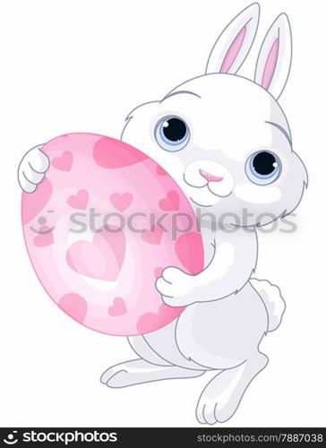 A cute Easter bunny holds brightly colored egg