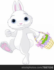 A cute Easter bunny holds full basket of colored egg