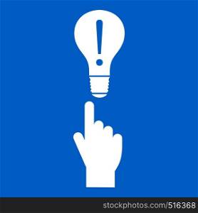 A finger pointer and light bulb icon white isolated on blue background vector illustration. A finger pointer and light bulb icon white