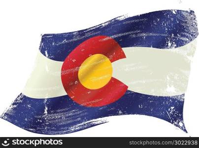 A flag of Colorado with a grunge texture in the wind