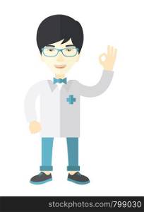 A friendly asian doctor in glasses and medical gown shows sign all ok vector flat design illustration isolated on white background. Vertical layout.. Doctor.