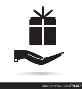 a gift in the hand icon. hand and gift sign. flat style. hand and gift icon for your web site design, logo, app, UI.
