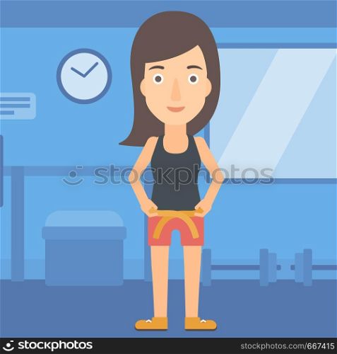 A happy woman measuring her waistline with a tape in the gym vector flat design illustration. Square layout.. Woman measuring waist.