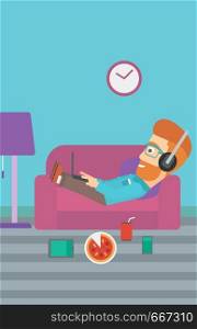 A hipster man in headphones lying on a sofa in living room with electronic devices and fast food vector flat design illustration. Vertical layout.. Man lying on sofa with many gadgets.