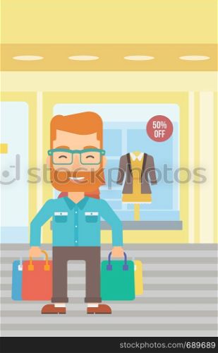 A hipster man with bags on the background of boutique window with dressed mannequins vector flat design illustration. Vertical layout.. Happy customer with bags.