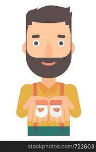 A hipster man with the beard holding baby booties in hands vector flat design illustration isolated on white background. . Man holding baby booties.