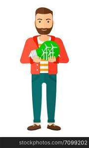 A hipster man with the beard holding in hands a big light bulb with small wind turbines inside vector flat design illustration isolated on white background. Vertical layout.. Man with lightbulb and windmill inside.