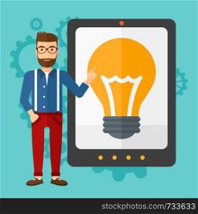 A hipster man with the beard pointing at a big tablet computer with a light bulb on a screen on a blue background with cogwheels vector flat design illustration. Square layout.. Man pointing at tablet computer with light bulb on screen.
