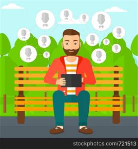 A hipster man with the beard sitting on a bench in the park and holding a tablet computer with many avatar icons above vector flat design illustration. Square layout.. Social media network.
