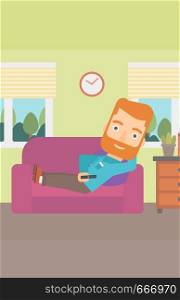 A man lying on a sofa and watching tv with a remote control in his hand vector flat design illustration. Vertical layout.. Man lying on sofa.