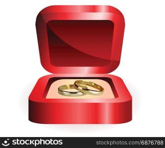 a pair of gold rings in the red box wedding