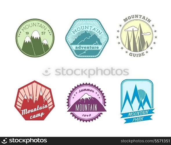 A set of high quality polyangular and round snowy mountains peaks travel guide labels icons