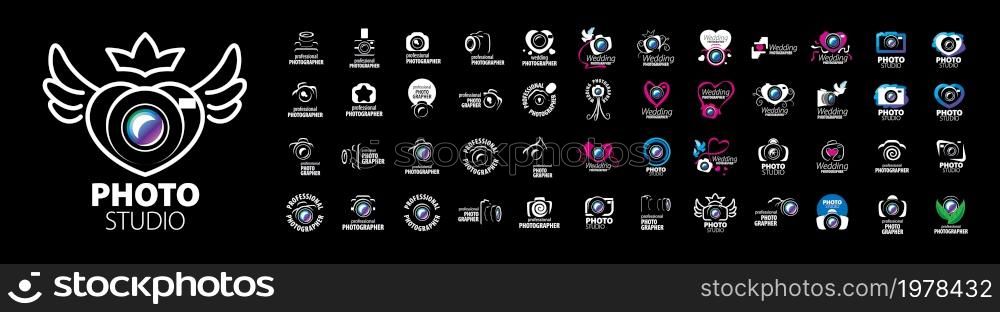 A set of vector logos by a professional photographer on a black background.. A set of vector logos by a professional photographer on a black background