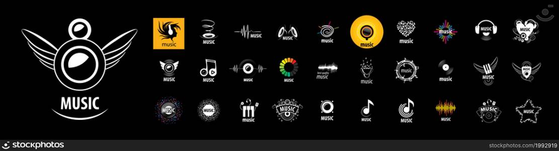 A set of vector logos Music on a black background.. A set of vector logos Music on a black background