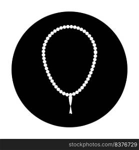 A white and black round pendant with a white bead on a black background