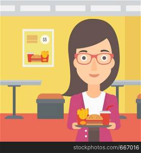 A woman holding a tray full of junk food on a cafe background vector flat design illustration. Square layout.. Woman with fast food.