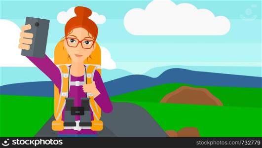 A woman making selfie on the background of hilly countryside vector flat design illustration. Horizontal layout.. Backpckaer making selfie.