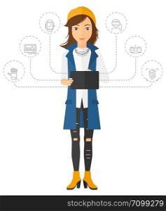 A woman standing with a tablet computer and some icons connected to the laptop vector flat design illustration isolated on white background. Vertical layout.. Woman holding tablet computer.