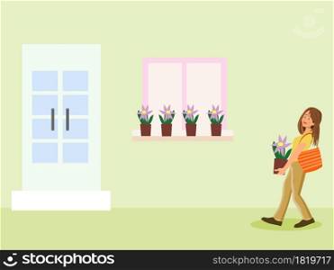 A woman walking with a flower pot with a door and a window in the background.