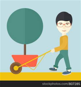 A young japanese man pushing the cart with green tree. Business growth concept. A Contemporary style with pastel palette, soft blue tinted background. Vector flat design illustration. Square layout.. Young man pushing the cart with tree.