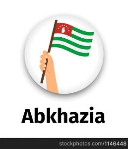 Abkhazia flag in hand, round icon with shadow isolated on white. Human hand holding flag, vector illustration. Abkhazia flag in hand, round icon
