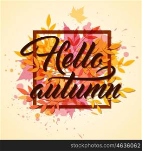 "Abstract autumn frame with red and orange leaves. "Hello autumn" lettering."