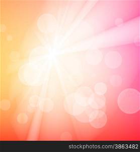 Abstract bokeh sparkles on orange blurred background