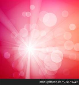 Abstract bokeh sparkles on pink blurred background