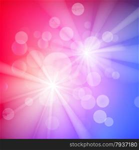 Abstract bokeh sparkles on purple and blue blurred background