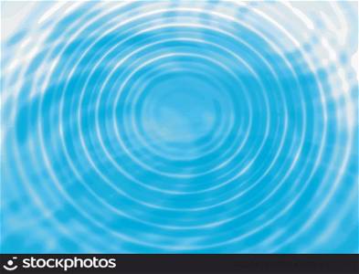 Abstract concentric water ripples blue background