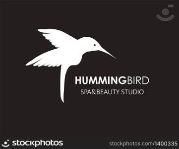 Abstract decorative stylized white hummingbird on black background. Vector logo design template. Decorative stylized hummingbird on white background