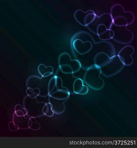 Abstract glowing heart shaped lights with copy space.