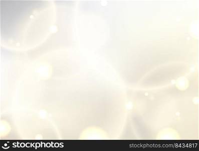 Abstract golden circles glow lights bokeh effect blurred background luxury style. Vector illustration
