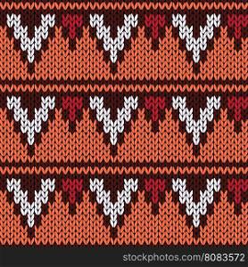 Abstract knitting ornamental seamless ethnic vector pattern with rows of geometric figures as a knitted fabric texture in warm colors