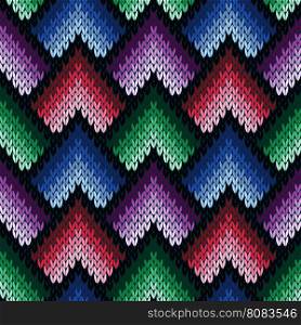 Abstract ornamental knitting seamless vector pattern as a knitted fabric texture in various hues of blue, violet, green and pink colors
