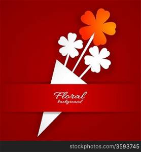 Abstract paper flower on a red background