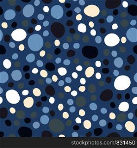Abstract pebble seamless pattern on blue background. Random geometric dotted wallpaper. Chaotic stones backdrop. Vector illustration. Abstract pebble seamless pattern on blue background.