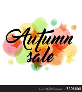 Abstract vector banner for seasonal autumn sale with maple leaves and watercolor blots.