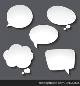Abstract white paper speech bubbles on gray background. Abstract white paper speech bubbles on gray background.