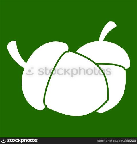 Acorn icon white isolated on green background. Vector illustration. Acorn icon green