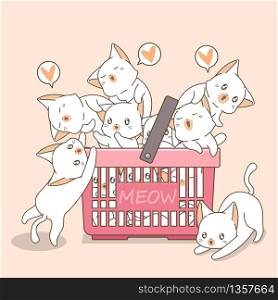Adorable cats in the pink basket