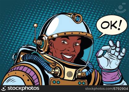 African American astronaut OK gesture, pop art retro vector illustration. Space and scientific research. Okay all good