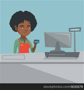 African-american cashier standing at the checkout and holding a credit card. Young cashier making payment by credit card. Cashier showing a credit card. Vector cartoon illustration. Square layout.. Young african-american cashier holding credit card