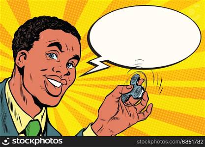 African American man with the spinner in hand. Pop art retro comic book vector illustration. African American man with the spinner in hand