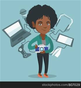 African-american woman standing among gadgets and taking photo with a digital camera. Woman using many electronic gadgets. Girl addicted to modern gadgets. Vector cartoon illustration. Square layout.. Young african-american woman surrounded by gadgets