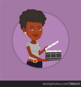 African-american woman working with a clapperboard. Woman holding an open clapperboard. Woman holding blank movie clapperboard. Vector flat design illustration in the circle isolated on background.. Smiling woman holding an open clapperboard.